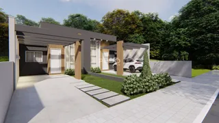 Fachada moderna de uma residência com área de entrada coberta e jardim.