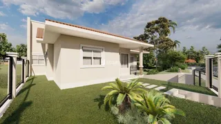 Fachada de uma casa moderna com jardim em Lajeado, Brasil.