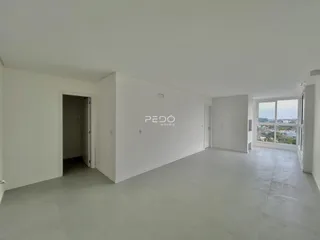 Vista interna de um corredor ou área comum de um imóvel em Lajeado.