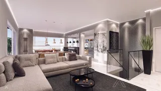 Sala de estar ampla com sofá grande e decoração moderna em um apartamento.