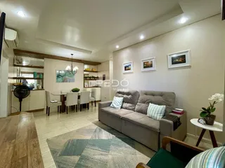 Sala de estar de um imóvel em Lajeado, Brasil, com decoração moderna.
