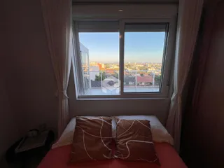 Quarto com vista para a paisagem urbana de Lajeado, Brasil.