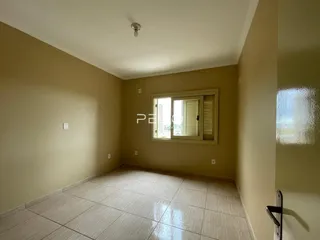 Foto de um ambiente interno com piso de cerâmica.