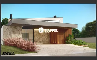 Fachada moderna de uma casa em Lajeado, Brasil, com paisagismo frontal.