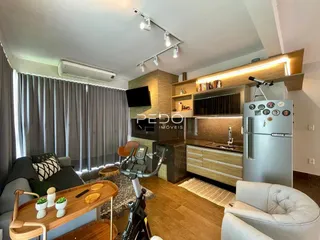 Sala de estar e cozinha de um imóvel em Lajeado, Brasil.