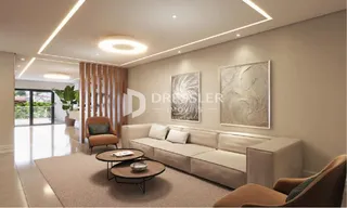 Sala de estar com sofá e decoração moderna em um imóvel no Brasil.