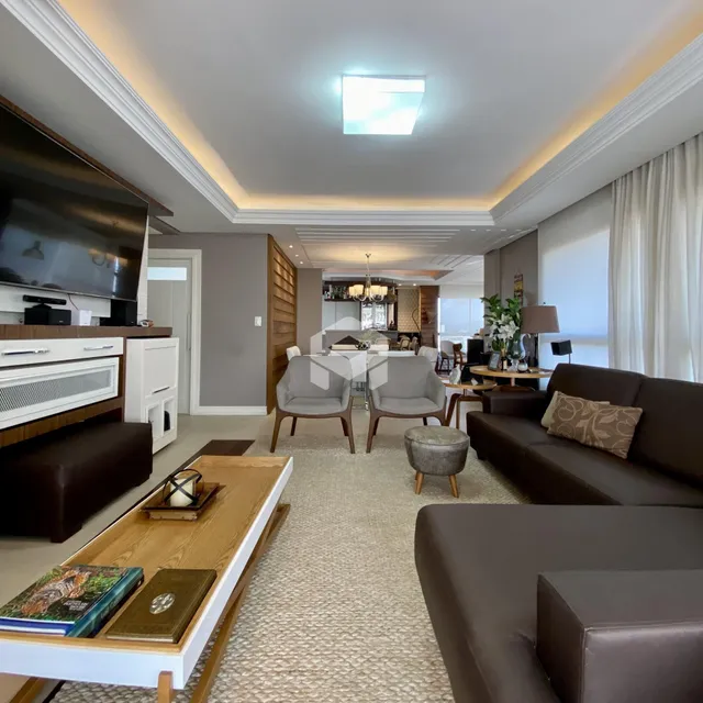 Sala de estar e jantar de um apartamento em Lajeado, Brasil.