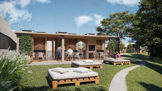 Fachada de uma casa moderna com área externa e jardim em Lajeado, Brasil.