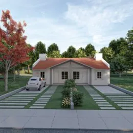 Fachada de uma casa em Lajeado, Brasil, com telhado de cor avermelhada e gramado em frente.