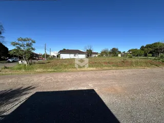 Vista externa de uma residência em Lajeado, Brasil, com área gramada ao redor.