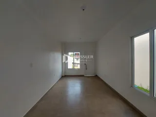 Vista interna de um corredor de um imóvel em Lajeado.