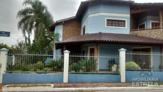 Casa com 4 dormitórios, foto 1
