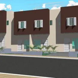 Fachada externa de uma residência em Lajeado, Brasil, com revestimento em tons de marrom e bege.