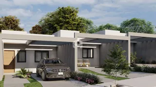 Fachada de uma casa moderna em Lajeado, Brasil, com jardim e garagem.