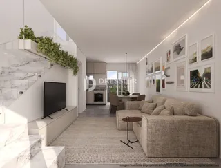 Sala de estar moderna com decoração de arte em uma residência no Brasil.