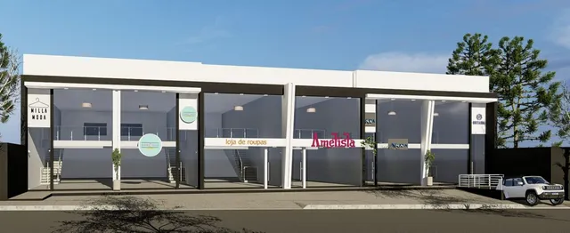 Fachada de um prédio comercial com grandes painéis de vidro.