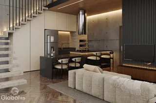 Interior moderno de uma sala de estar com cozinha e escadaria em um imóvel.