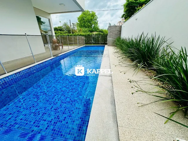 Foto de uma piscina externa em um imóvel em Lajeado.