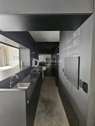Vista de um corredor interno de uma propriedade em Lajeado, Brasil.