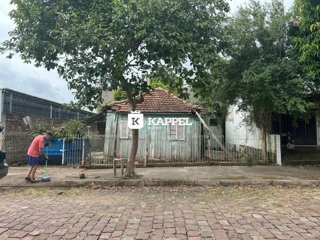Vista externa de uma casa com telhado de telhas vermelhas em Lajeado.