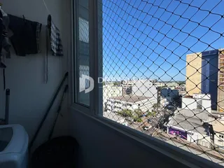 Vista da janela de um imóvel em Lajeado, Brasil, com cerca de tela.