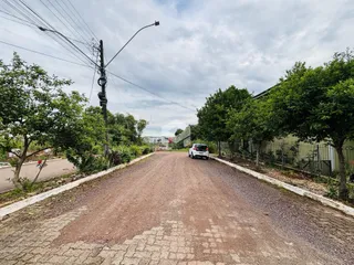 Vista da estrada de acesso a uma propriedade em Lajeado, Brasil.