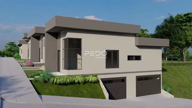 Fachada de uma casa moderna em Lajeado, Brasil, com garagem e jardim.