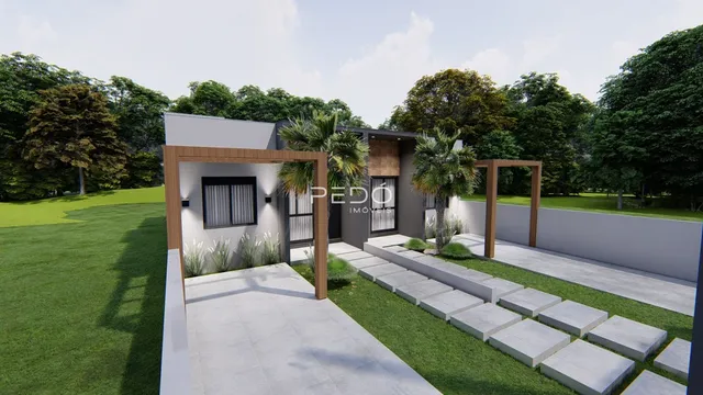 Fachada moderna de uma residência com jardim e área externa.