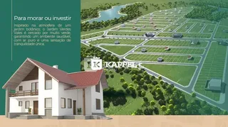 Fachada de uma casa residencial com paisagismo verde em Lajeado.