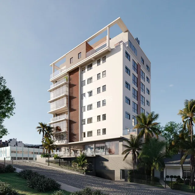 Fachada de um prédio residencial em Lajeado, Brasil, com vista para a paisagem tropical.