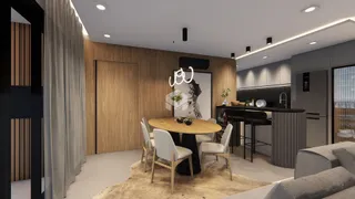 Ambiente moderno de sala de jantar e cozinha em um imóvel.