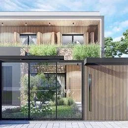 Fachada moderna de uma residência com revestimento de madeira e grandes painéis de vidro.