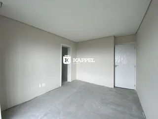 Foto de um corredor interno de um imóvel em Lajeado, Brasil.