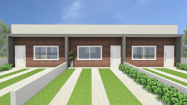 Fachada frontal de uma residência com jardim e calçada em Lajeado, Brasil.