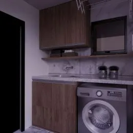 Foto de uma cozinha com armários de madeira e bancada.
