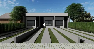Fachada de uma casa moderna com jardim e calçada em Lajeado.