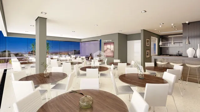 Sala de jantar ampla com vista para o mar em um imóvel no Lajeado.