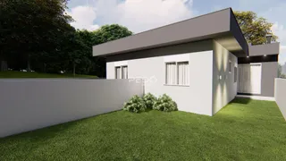 Fachada moderna de uma residência com jardim gramado.