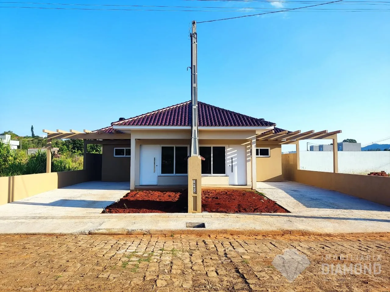 Casa geminada com 2 dormitórios, foto 1