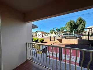 Vista externa mostrando uma rua e casas na área de Lajeado.
