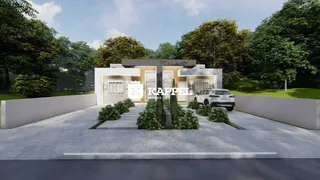 Fachada moderna de uma residência em Lajeado, Brasil, com paisagismo frontal.