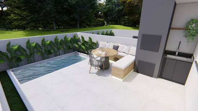 Vista da piscina e área externa com deck em Lajeado.