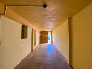 Corredor interno de um imóvel em Lajeado, Brasil.