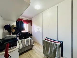 Quarto com armários em Lajeado, Brasil, mostrando o ambiente interno.