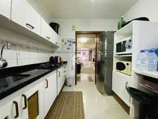 Vista da cozinha e hall de uma propriedade em Lajeado, Brasil.