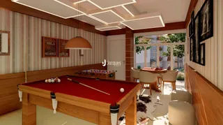Sala com mesa de bilhar em ambiente interno.