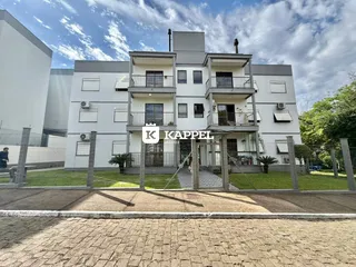 Fachada de um prédio residencial moderno com varandas em Lajeado, Brasil.