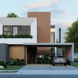 Fachada moderna de uma residência em Lajeado, Brasil, com revestimento de tijolos aparentes.