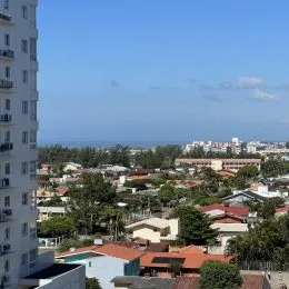 Vista panorâmica da paisagem urbana de Lajeado, Brasil, mostrando edifícios e vegetação.