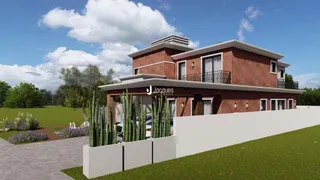 Fachada de casa em tijolo vermelho com varanda.